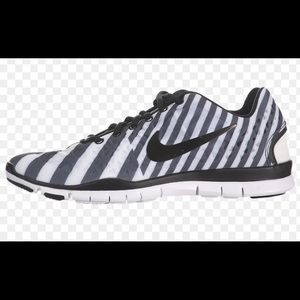 Nike striped running shoes / trainers